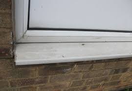 old weathered UPVC window