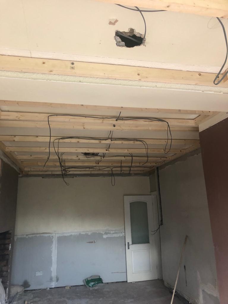 open suspended ceiling and wires for spotlights