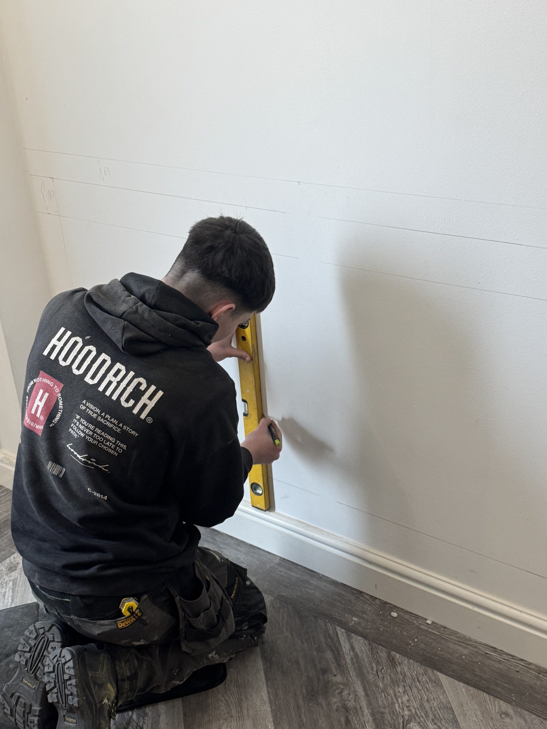 wall panelling being marked out