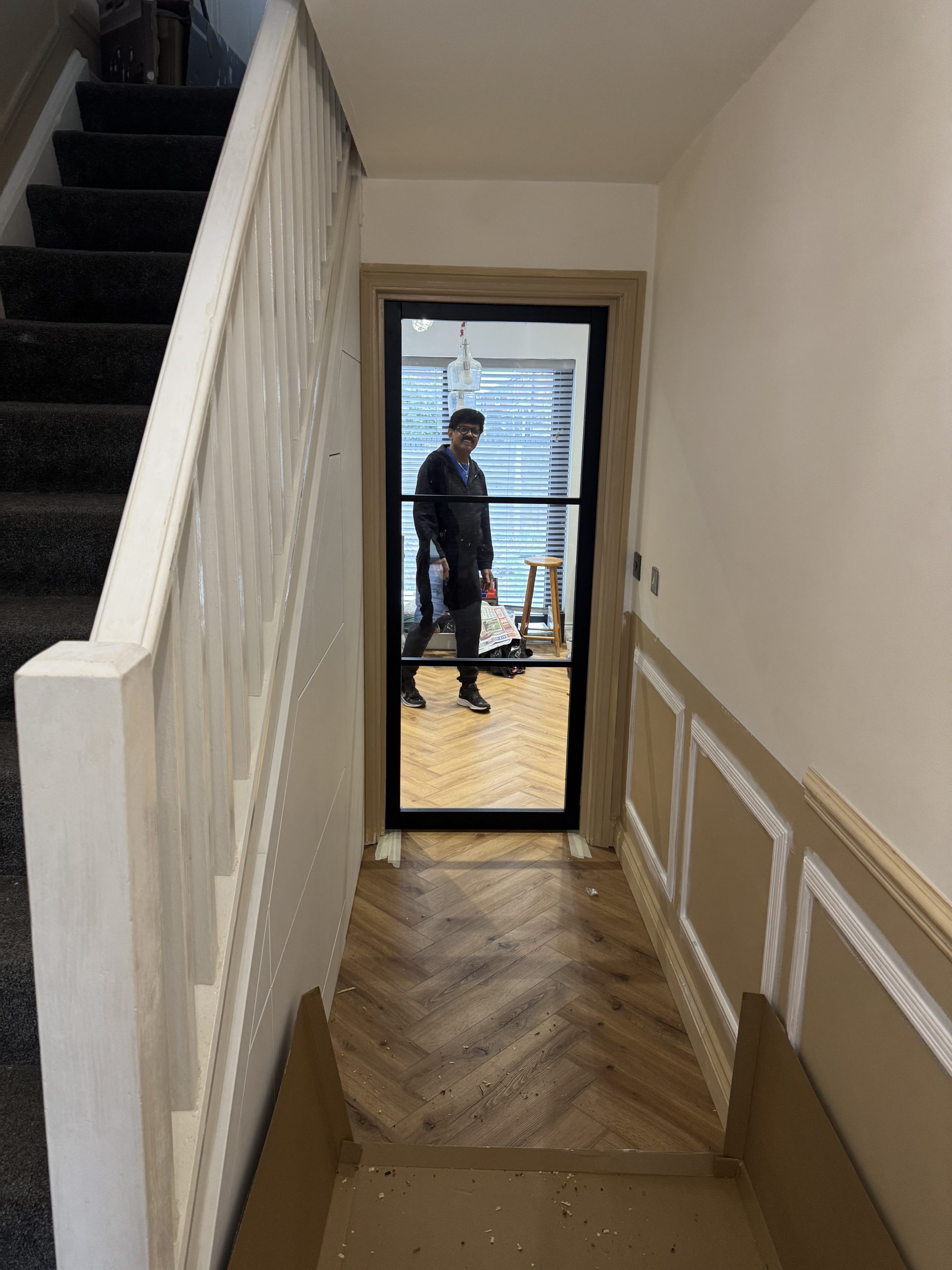 oak herringbone flooring and wall panelling