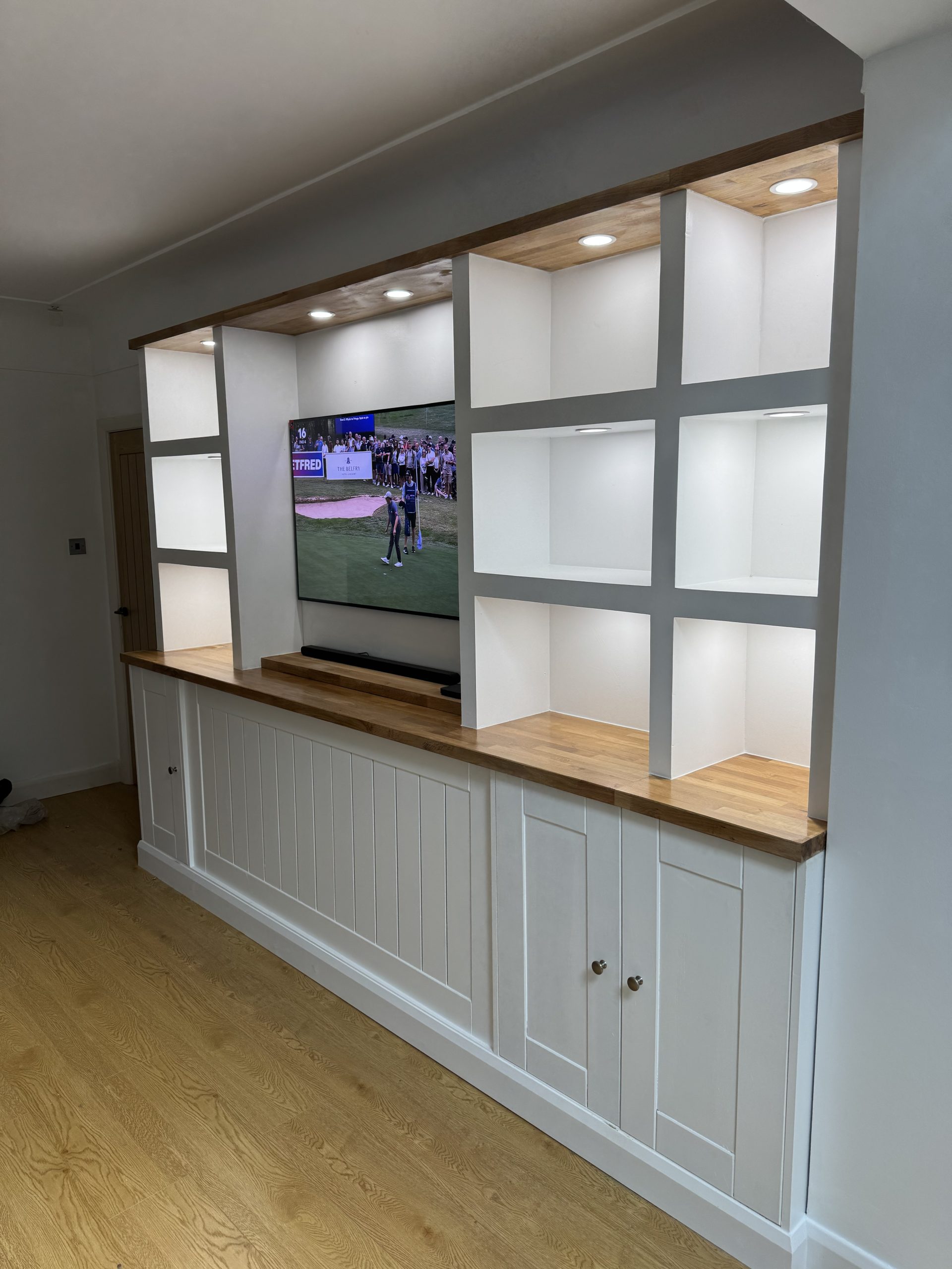 Custom built bespoke media unit with oak worktops